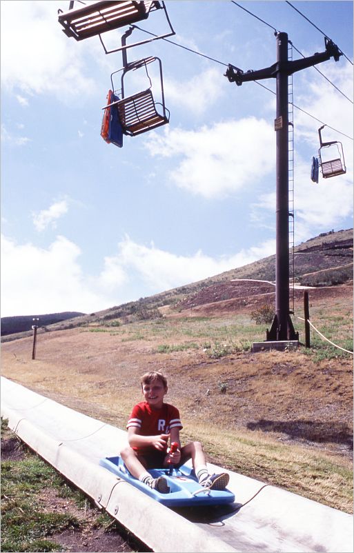 Huge water slide on the side of a mountain